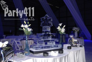 ice castle created using specialty lighting and fabric, linens and white florals - Vincent Lighting and Pieter Bouterse Studio