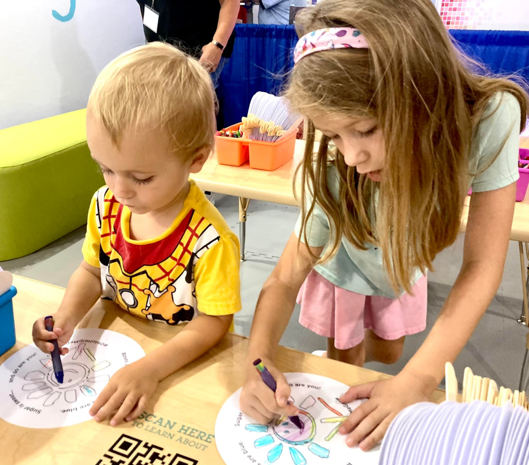 480352644_1045667374255074_5130309055003749189_n Governor's Passport Activity - Sensory Activation - Help Me Grow State Fair Booth